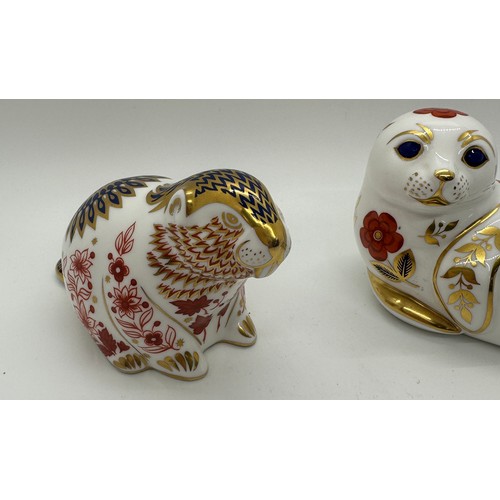 418 - Two Royal Crown Derby paperweights, Beaver with date code for 1994 (LVII) and a Seal, both with gold... 