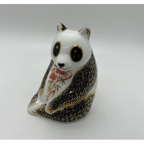 425 - A Royal Crown Derby paperweight, Panda, modelled by Robert Jefferson and decoration designed by Rita... 