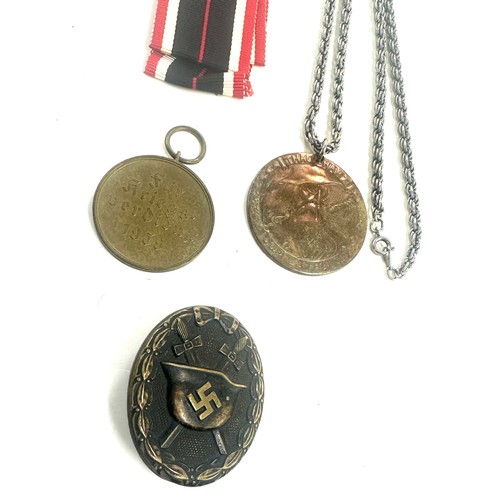 470 - WW2 German service medal ribbon and packet badge Wgimar coin connected to medal Wound’ Badge and Wei... 