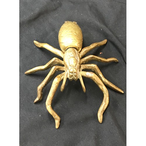 106 - 2 Brass spider ornaments