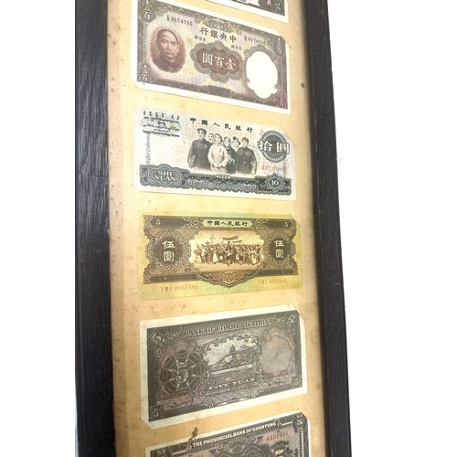 269 - Framed Chinese and Japanese vintage bank notes measures approximately 31 inches tall