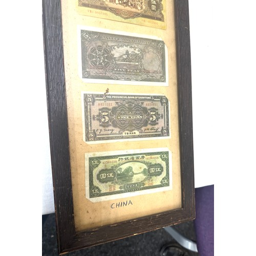 269 - Framed Chinese and Japanese vintage bank notes measures approximately 31 inches tall