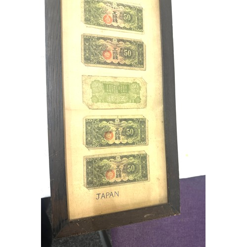 269 - Framed Chinese and Japanese vintage bank notes measures approximately 31 inches tall