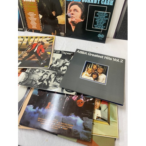 84 - Large selection of assorted records includes elvis, Johnny cash, Abba etc