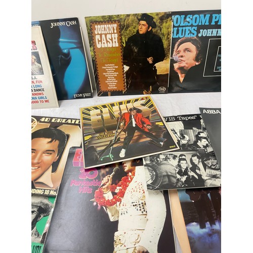 84 - Large selection of assorted records includes elvis, Johnny cash, Abba etc