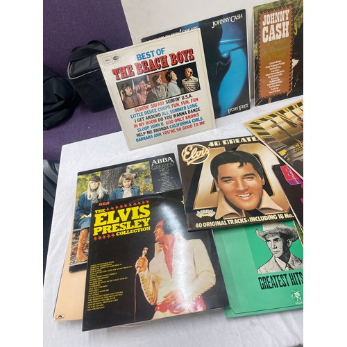 84 - Large selection of assorted records includes elvis, Johnny cash, Abba etc