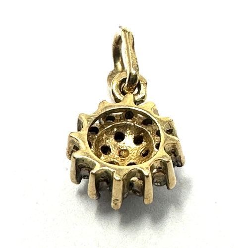 57 - 9ct gold diamond pendant weight 0.5g