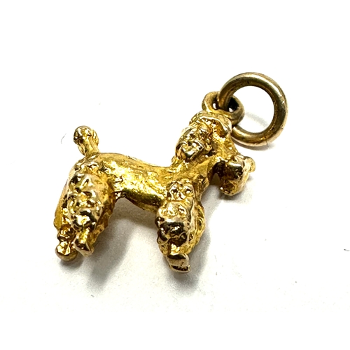 59 - 9ct gold poodle charm weight 1.5g