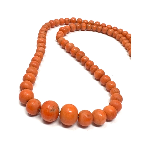 67 - Antique graduated coral necklace largest bead measures approx 14.5mm dia weight 24g missing clasp