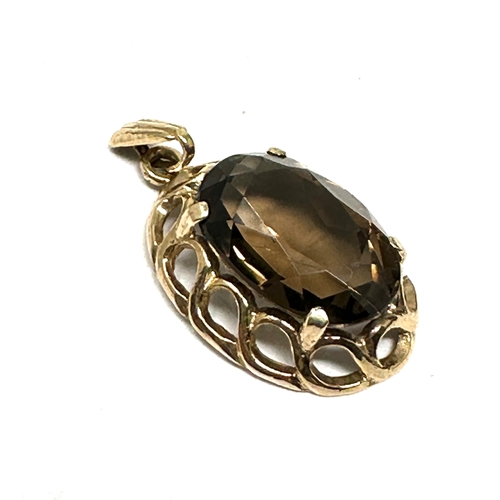 69 - 9ct gold & smoky quartz pendant weight 2.4g