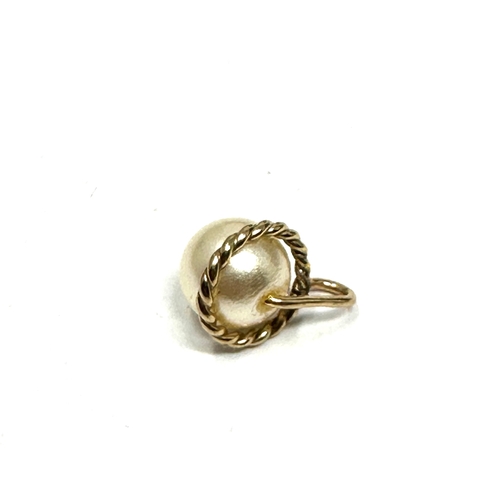 95 - small 14ct gold pearl pendant weight 0.5g