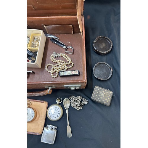 580 - Leather travelling case containing pocket watches, whistle, lighter, watches, travelling clock etc