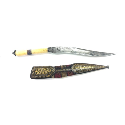 440 - Unusual Persian dagger. Chisel decoration to blade. Scabbard fittings inlaid with gold. Approx lengt... 