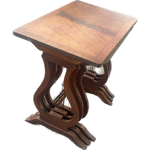 348 - Mahogany nest of 3 tables largest measures approximately 21 inches tall