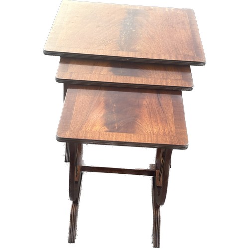 348 - Mahogany nest of 3 tables largest measures approximately 21 inches tall