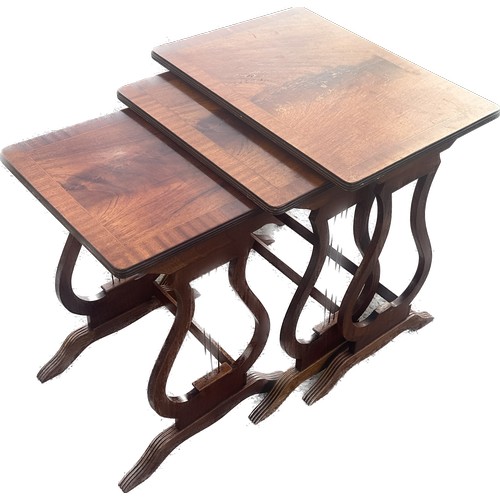 348 - Mahogany nest of 3 tables largest measures approximately 21 inches tall