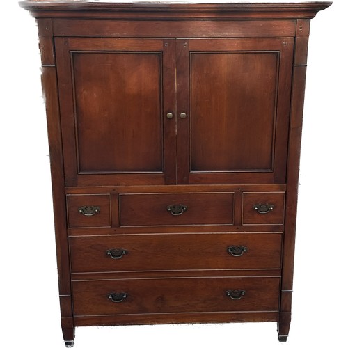 344 - Two door 5 drawer cherry wood unit measures approx 58 inches tall by 44.5 inches wide and 25 inches ... 