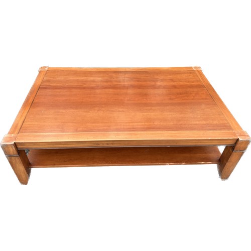 353 - Large 1 shelf cherry wood coffee table measures approx 19 inches tall by 63 inches wide and 39.5 inc... 