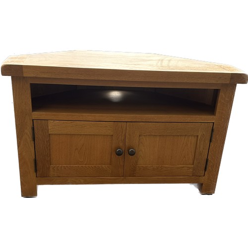 331 - Pine one shelf two door tv unit measures approx 24 inches tall by 39.5 wide by 20 deep