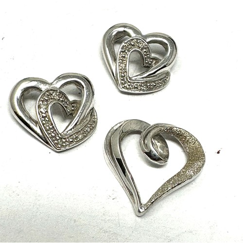 284 - 3 X 9ct White Gold Diamond  Pendants (3g)