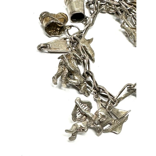 300 - A Vintage Silver Charm Bracelet With Assorted Novelty Charms (62g)