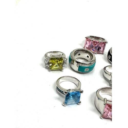 303 - A collection of silver  cocktail rings (108g)