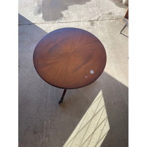 337 - Vintage occasional table on casters measures approximately 20.5 inches tall 20 inches diameter