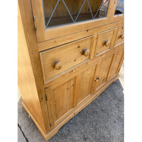 345 - Pine 3 drawer 2 door glazed kitchen cabinet measures approximateky 71 inches tall 57 inches wide 21 ... 