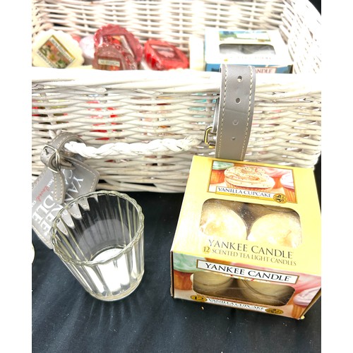 59 - Yankee candle wicker hamper with various tea lights small candles etc