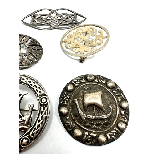 342 - Five silver Celtic design brooches (49g)