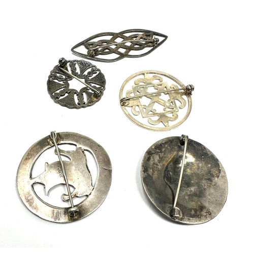 342 - Five silver Celtic design brooches (49g)