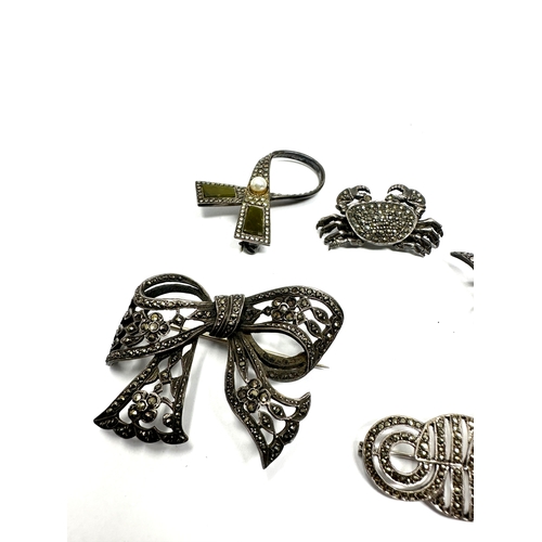 341 - Five silver marcasite brooches (53g)