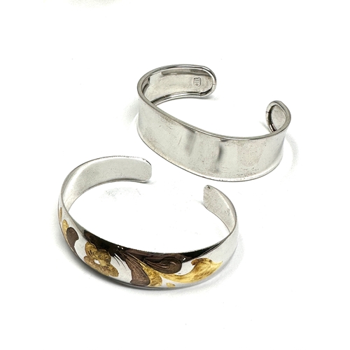 328 - Two silver bangles (39g)