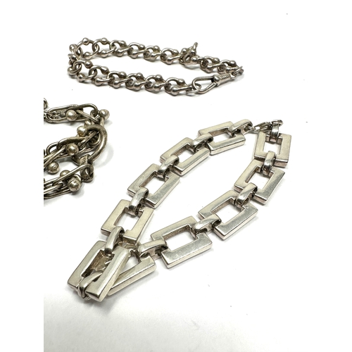 345 - Three silver bracelets (89g)