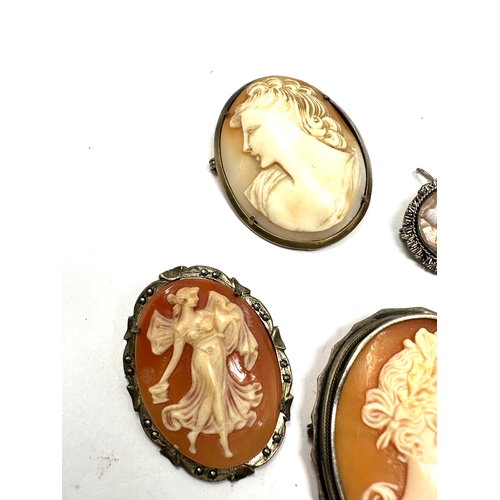 363 - Four silver mounted carved shell cameo brooches (31g)