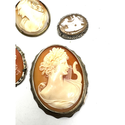 363 - Four silver mounted carved shell cameo brooches (31g)