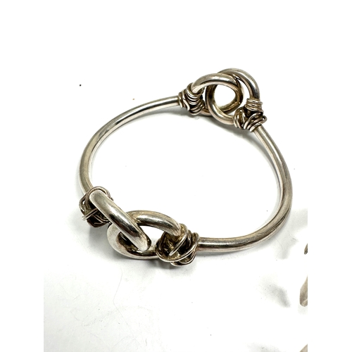 312 - Two silver bangles (72g)