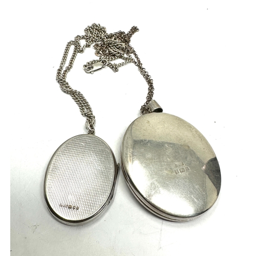 361 - Two vintage silver lockets with chains (58g)