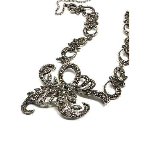 318 - A silver marcasite necklace and bracelet (37g)