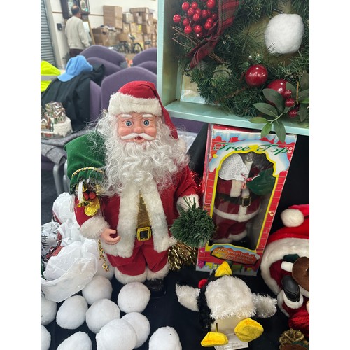 298 - Large selection of vintage and later Christmas decorations to include Santa figure, Christmas wreath... 