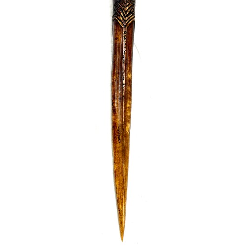 478 - Papua New Guinea carved cassowary bone daggers having incised motifs approximate length 41cm