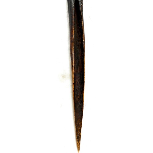 478 - Papua New Guinea carved cassowary bone daggers having incised motifs approximate length 41cm