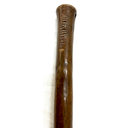 475 - African tribal club weighted, detailing to acorn head, marks to handle possibly kill marks, approxim... 