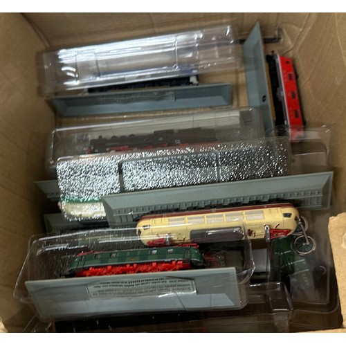 98 - Large selection of train and railway accessories to include engines, DVDS, model railways etc