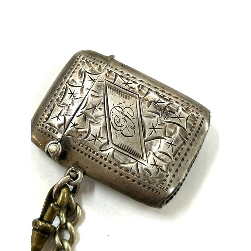 491 - Antique silver vesta case, silver fob and a plated albert chain 23 grams