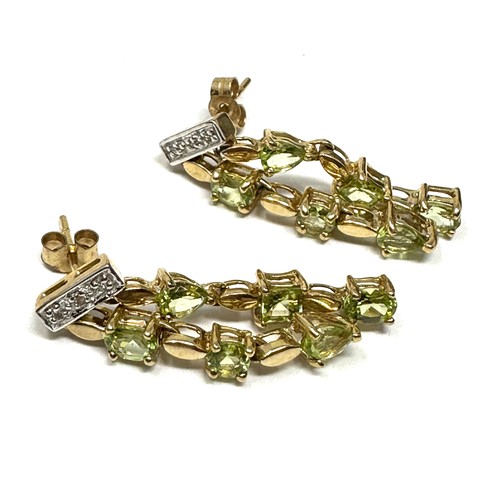 156 - 9ct gold diamond & peridot drop earrings (3.4g)