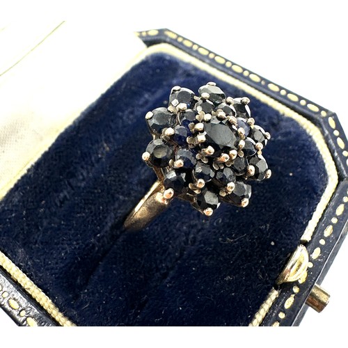 180 - 9ct gold sapphire floal cluster ring (3.1g)