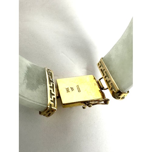 233 - 14ct gold jade oriental style panel bracelet (31.4g)