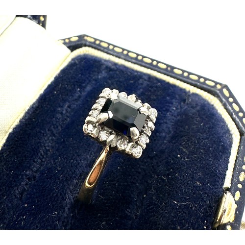 258 - 9ct gold sapphire single stone ring with diamond surround (2g)