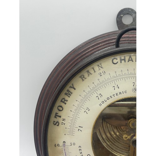 482 - C J Gaupp & Co Hong Kong wall hanging circular barometer, approximate diameter 8.5 inches